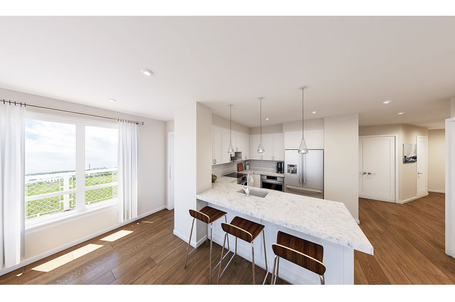 Couple with coffee mugs enjoying scenic views out the large windows at Seascape at Weymouth