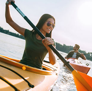 Kayaking couple at Seascape at Weymouth